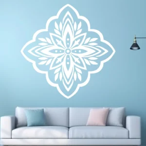 Moroccan Leaf Wall Sticker in White on a Light Blue Wall Above a White Sofa.