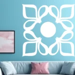 White Moroccan Four petal Wall Sticker on a Teal Wall Above a Light Blue Sofa with Pink and Grey Cushions | Stickers on Wall