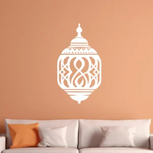 White Moroccan Lantern Wall Sticker with Geometric Cutouts on a Peach Wall Above a Beige Sofa with Cushions.