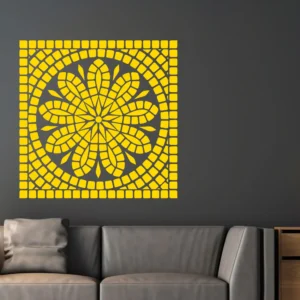 Yellow Mosaic Rosette Wall Sticker on a Dark Gray Wall Above a Gray Sofa.