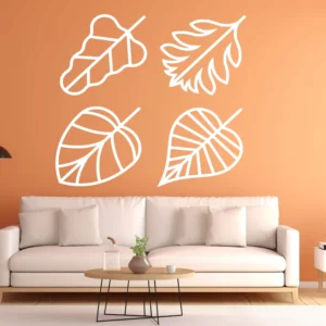 Leaf Outline Wall Sticker with Four Minimalist Botanical Leaf Outlines Above a Beige Sofa on a Warm Orange Wall.
