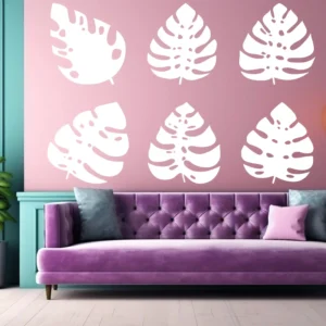 Monstera Leaf Wall Sticker Set (6 Pieces) in White Above Purple Sofa on Soft Pink Wall