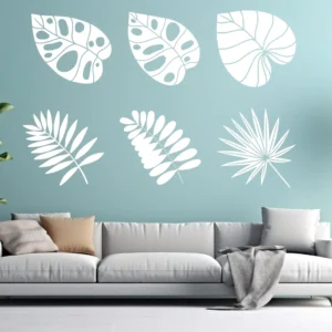 Silhouette Leaf Wall Sticker Set of Six Botanical Leaves on a Light Blue Wall Above a Grey Sofa