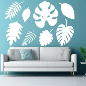 Tropical Leaf Set (8 Pieces) White Vinyl Wall Stickers Above a Light Grey Sofa on a Blue Wall