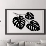 Monstera Leaf Branch Wall Sticker Displayed As Framed Wall Art Above Modern Living Room Sofa | Stickers on Wall