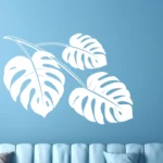 White Monstera Wall Sticker in Branch Design on Blue Feature Wall Above Sofa | Stickers on Wall